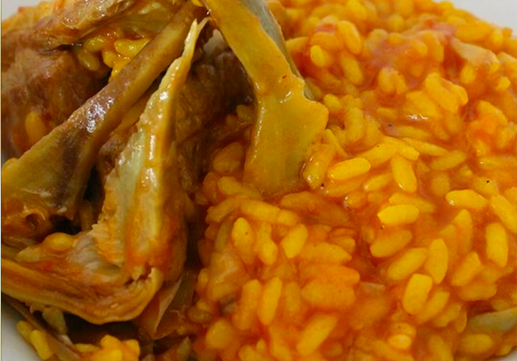 Arròs caldós amb conill i carxofes