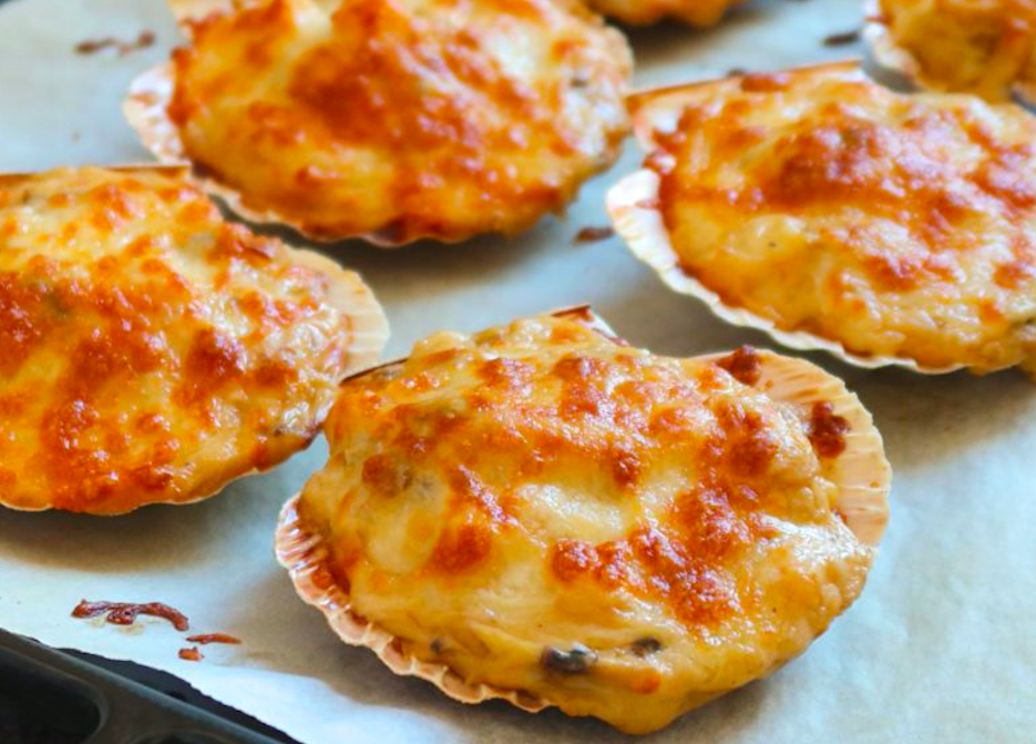Vieires gratinades farcides de marisc